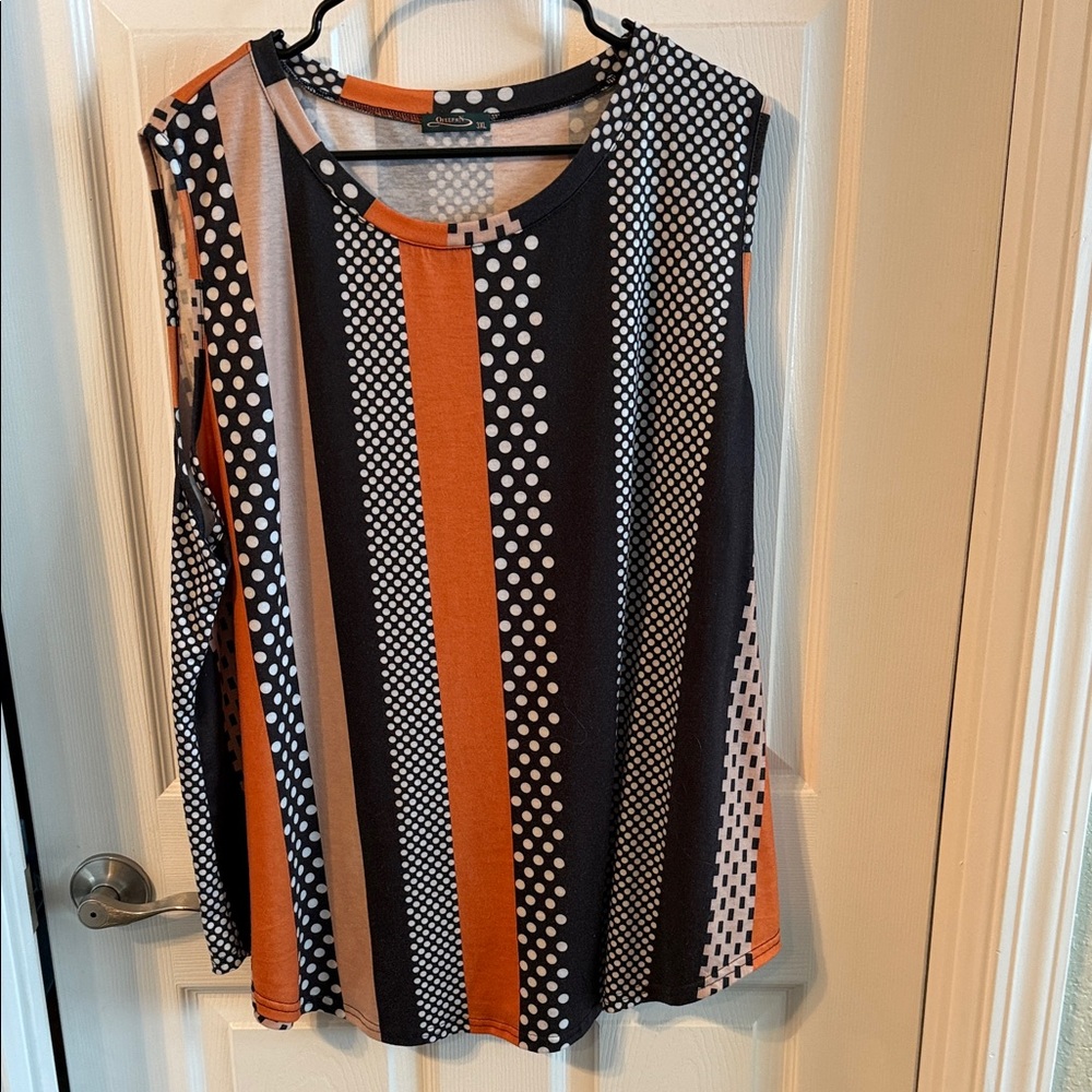 New never worn. No tags. Beautiful bright sleeveless top. Casual
